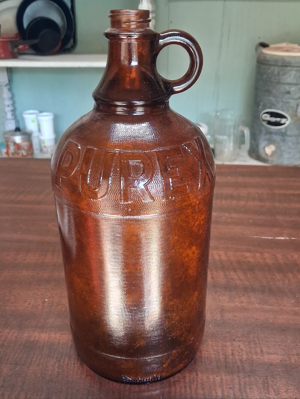 Embossed Amber Glass Jug "PUREX"
